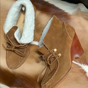 Michael Kors suede fur lined booties.